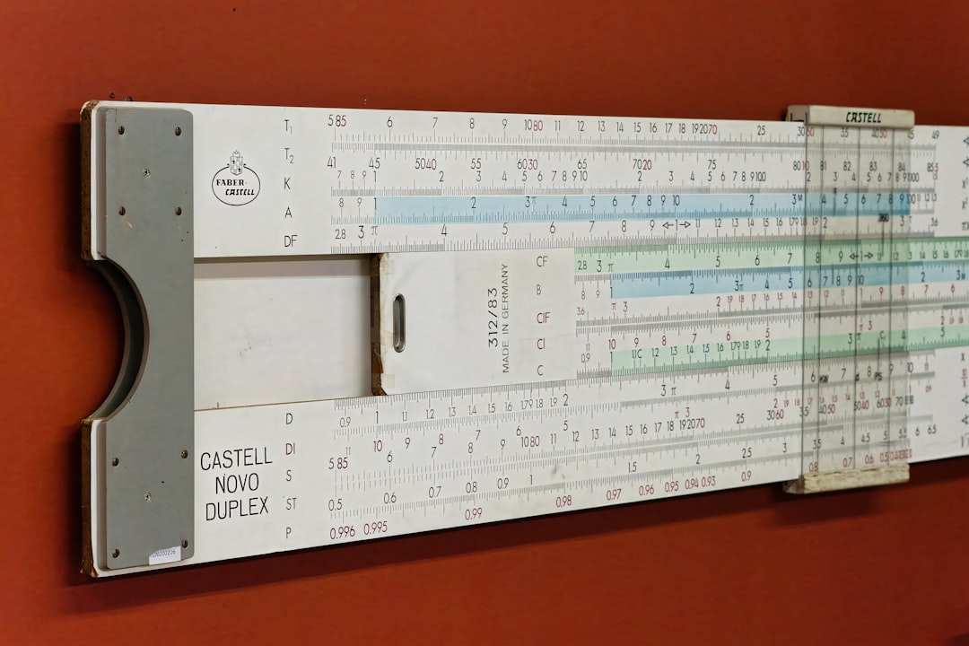 A large ruler mounted to the side of a wall