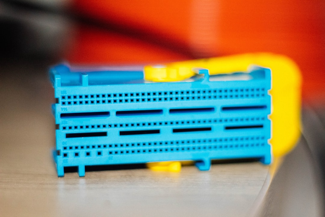 a blue plastic container sitting on top of a table